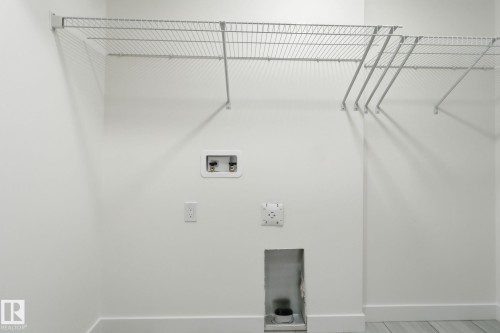 7 2710 66 St, Edmonton, AB - Indoor With Storage