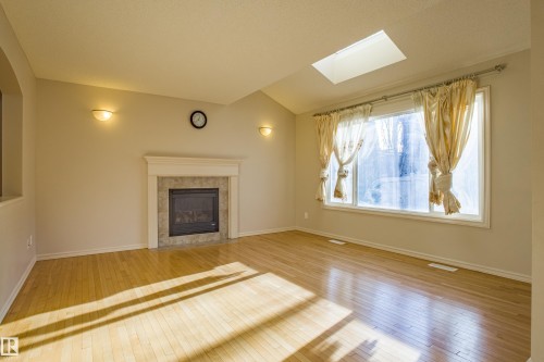 1253 Latta Crescent, Edmonton, AB - Indoor Photo Showing Living Room With Fireplace