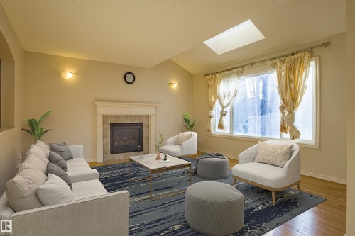 1253 Latta Crescent, Edmonton, AB - Indoor Photo Showing Living Room With Fireplace