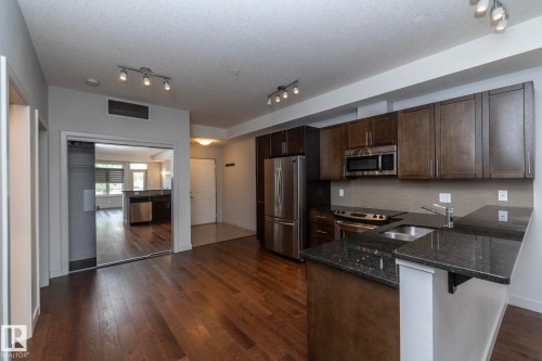 213 10811 72 Avenue, Edmonton, AB - Indoor Photo Showing Kitchen With Double Sink With Upgraded Kitchen