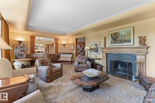 8 Valleyview Point(E), Edmonton, AB - Indoor Photo Showing Living Room With Fireplace