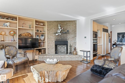 8 Valleyview Point(E), Edmonton, AB - Indoor Photo Showing Living Room With Fireplace