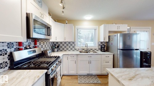 4934 50 Street, Buck Creek, AB - Indoor Photo Showing Kitchen With Double Sink