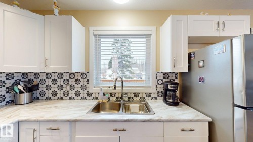 4934 50 Street, Buck Creek, AB - Indoor Photo Showing Kitchen With Double Sink