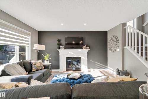 17437 5A Avenue, Edmonton, AB - Indoor Photo Showing Living Room With Fireplace