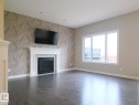 16707 18 Avenue, Edmonton, AB  - Indoor Photo Showing Living Room With Fireplace 