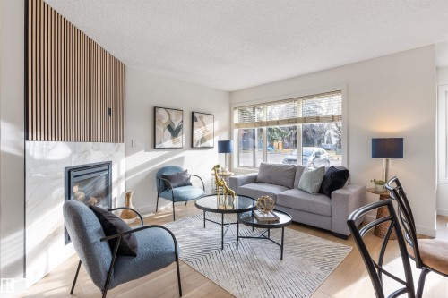 106 81 Garden Road, St. Albert, AB - Indoor Photo Showing Living Room With Fireplace
