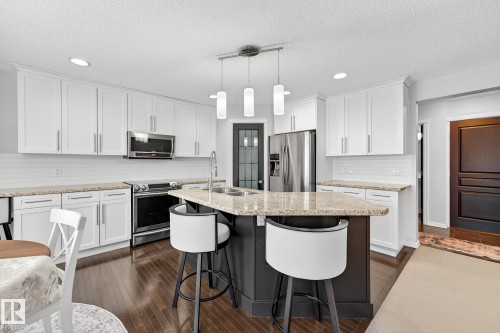 46 Snowbird Crescent, Leduc, AB - Indoor Photo Showing Kitchen With Stainless Steel Kitchen With Double Sink With Upgraded Kitchen