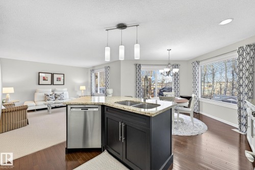46 Snowbird Crescent, Leduc, AB - Indoor Photo Showing Kitchen With Double Sink With Upgraded Kitchen