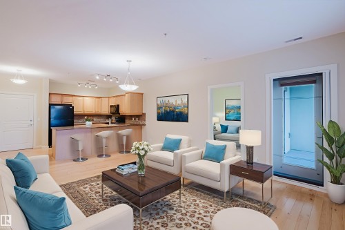 409 160 Magrath Road, Edmonton, AB - Indoor Photo Showing Living Room