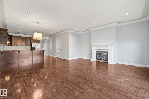 7317 106 Street, Edmonton, AB - Indoor Photo Showing Other Room With Fireplace