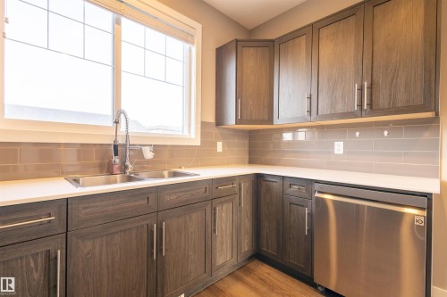 1150 Rosenthal Boulevard, Edmonton, AB - Indoor Photo Showing Kitchen With Double Sink
