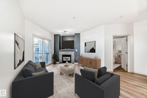 517 10235 112 Street, Edmonton, AB - Indoor Photo Showing Living Room With Fireplace