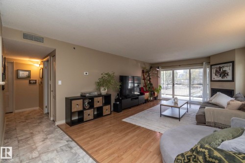 205 10130 114 Street, Edmonton, AB - Indoor Photo Showing Living Room