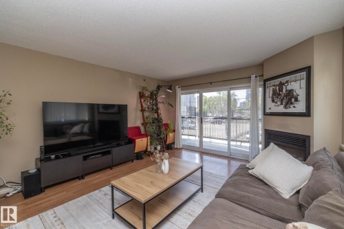205 10130 114 Street, Edmonton, AB - Indoor Photo Showing Living Room