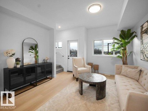 67 18120 28 Avenue, Edmonton, AB - Indoor Photo Showing Living Room