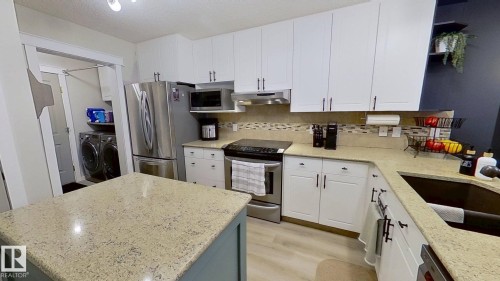 4118 29 Street, Edmonton, AB - Indoor Photo Showing Kitchen With Double Sink