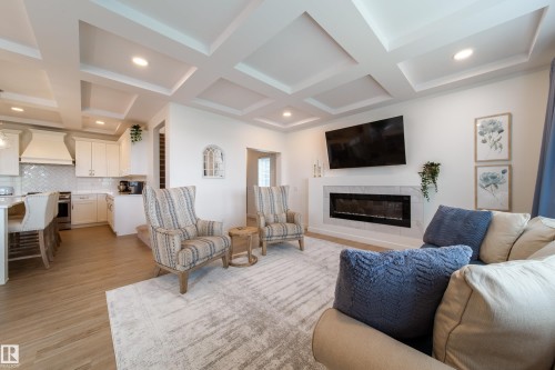 6204 67 Street, Beaumont, AB - Indoor Photo Showing Living Room With Fireplace