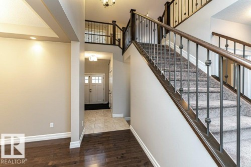 Foyer featuring a towering ceiling and wood finished floors - 3198 Winspear Crescent Sw, Edmonton, AB - Indoor Photo Showing Other Room