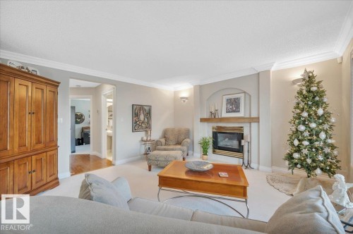 1371 Carter Crest Road, Edmonton, AB - Indoor Photo Showing Living Room With Fireplace