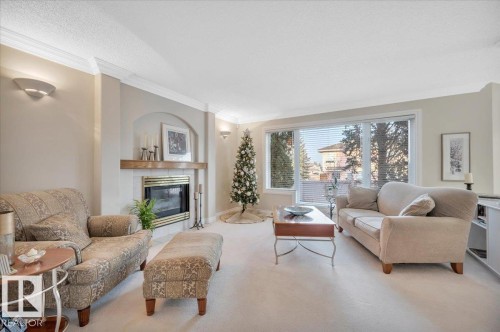 1371 Carter Crest Road, Edmonton, AB - Indoor Photo Showing Living Room With Fireplace