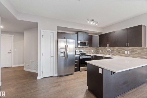 410 560 Griesbach Parade Parade, Edmonton, AB - Indoor Photo Showing Kitchen With Upgraded Kitchen