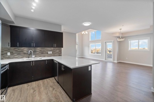 410 560 Griesbach Parade Parade, Edmonton, AB - Indoor Photo Showing Kitchen With Upgraded Kitchen