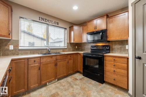123 63 Street, Edmonton, AB - Indoor Photo Showing Kitchen With Double Sink