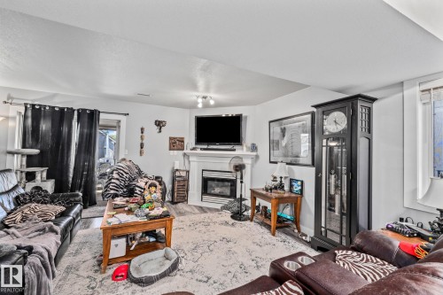 329 River Point, Edmonton, AB - Indoor Photo Showing Living Room With Fireplace