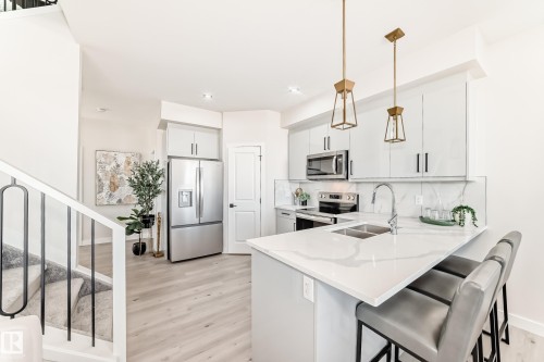 61 Patriot Way, Spruce Grove, AB - Indoor Photo Showing Kitchen With Double Sink With Upgraded Kitchen