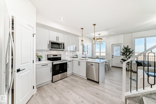 61 Patriot Way, Spruce Grove, AB - Indoor Photo Showing Kitchen With Upgraded Kitchen