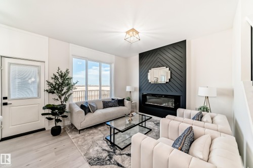 61 Patriot Way, Spruce Grove, AB - Indoor Photo Showing Living Room With Fireplace