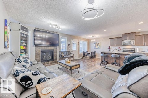 5416 67 Street, Beaumont, AB - Indoor Photo Showing Other Room With Fireplace
