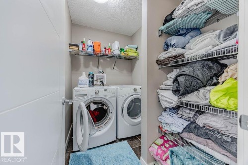 5416 67 Street, Beaumont, AB - Indoor Photo Showing Laundry Room