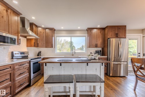 10114 102 Avenue, Morinville, AB - Indoor Photo Showing Kitchen With Double Sink