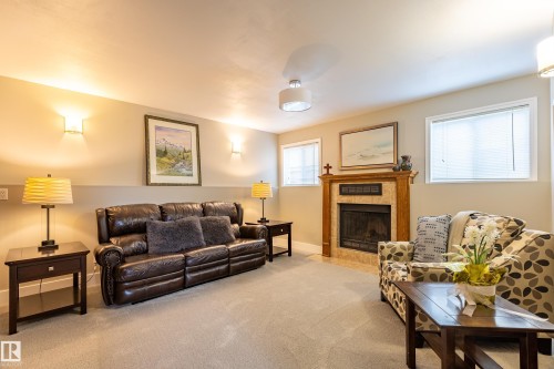 10114 102 Avenue, Morinville, AB - Indoor Photo Showing Living Room With Fireplace