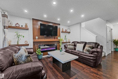 4449 6A Street, Edmonton, AB - Indoor Photo Showing Living Room With Fireplace