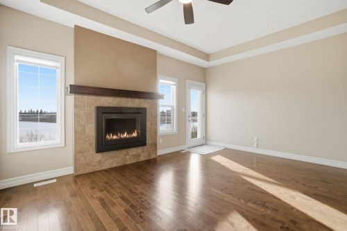 59 Selkirk Place, Leduc, AB - Indoor Photo Showing Living Room With Fireplace