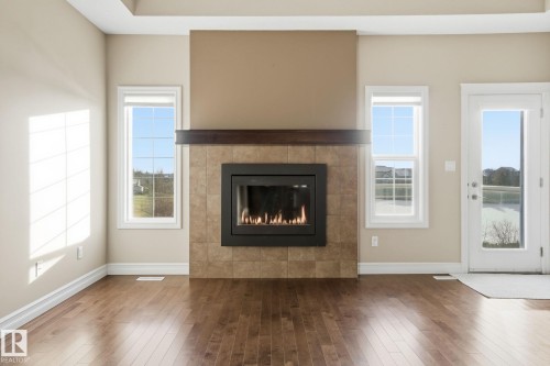 59 Selkirk Place, Leduc, AB - Indoor Photo Showing Living Room With Fireplace