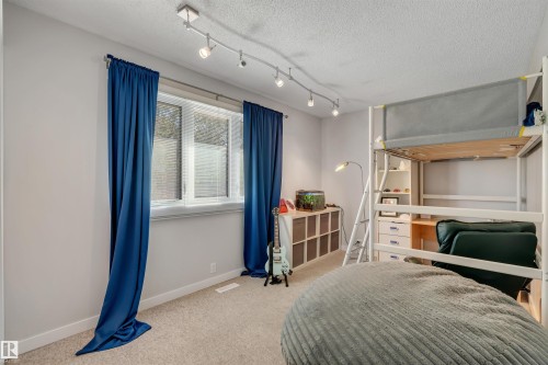 232 Ranchview Place Nw, Calgary, AB - Indoor Photo Showing Bedroom