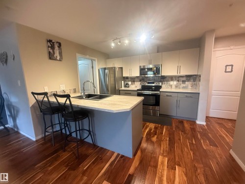 230 592 Hooke Road, Edmonton, AB - Indoor Photo Showing Kitchen With Double Sink