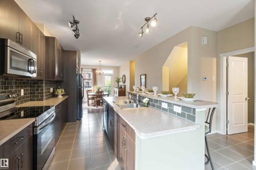 154 603 Watt Boulevard Sw, Edmonton, AB - Indoor Photo Showing Kitchen With Double Sink With Upgraded Kitchen