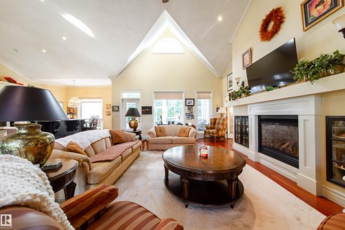 2A Silver Beach Road, Rural Wetaskiwin County, AB - Indoor Photo Showing Living Room With Fireplace