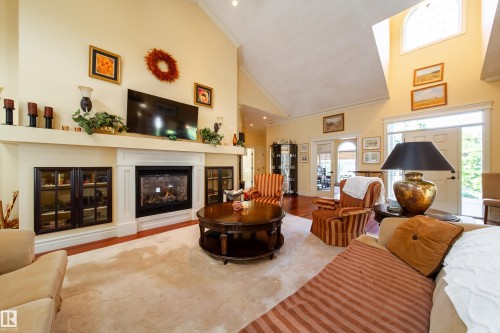 2A Silver Beach Road, Rural Wetaskiwin County, AB - Indoor Photo Showing Living Room With Fireplace