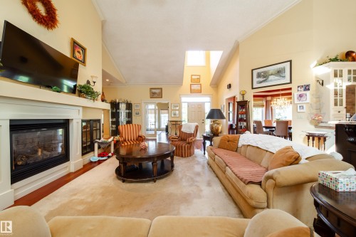 2A Silver Beach Road, Rural Wetaskiwin County, AB - Indoor Photo Showing Living Room With Fireplace