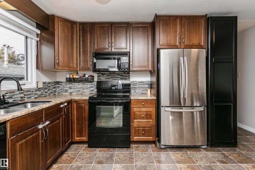 8412 71 Street, Edmonton, AB - Indoor Photo Showing Kitchen With Double Sink