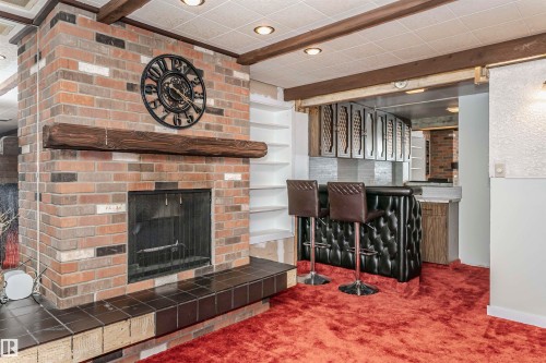 8412 71 Street, Edmonton, AB - Indoor With Fireplace