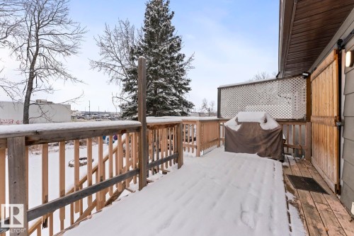 Snow covered deck featuring a grill - 4719 47 Avenue, Cold Lake, AB - Outdoor With Deck Patio Veranda