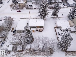 Snowy aerial view with a residential view - 