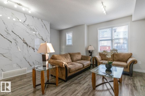 112 655 Watt Boulevard, Edmonton, AB - Indoor Photo Showing Living Room